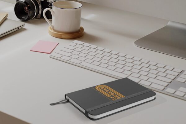 Notes bog med eget logo.